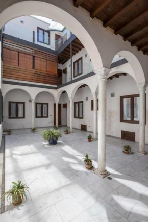Bustos Tavera, Seville
